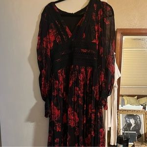 Beautiful dress black with red roses maxi size 4. Never worn